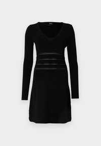 Black long-sleeve dress with a V-neck, featuring textured horizontal bands and decorative perforations around the waist and hem.