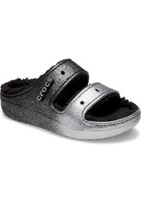 Ciabatta scivolosa grigia e nera con un superiore metallico luccicante, due cinturini regolabili e una morbida fodera in pile nera.