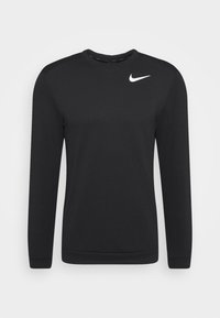 Sudadera negra de manga larga hecha de un tejido suave; presenta un cuello redondo y un logo blanco de Nike en la parte superior izquierda del pecho.