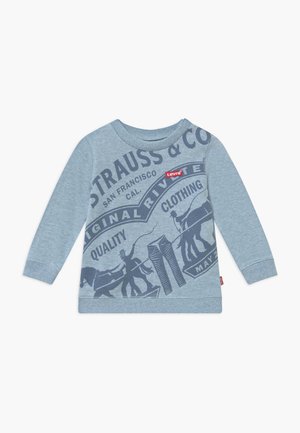 Sweat-shirt à manches longues bleu clair avec un imprimé graphique bleu foncé représentant des cowboys et des jeans, col rond côtelé et poignets. Étiquette de logo Levi's incluse.