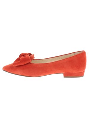 Red suede flat shoe features a pointed toe, a low heel, and a knotted bow accent on the vamp. Soft texture with smooth interior lining.