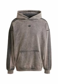 Puluver hoodie i tvättad grå tyg med en känguruficka, ribbade muddar och svarta tre-stripes detaljer på ärmarna. Svart logotyp på bröstet.