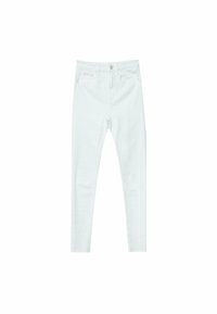 Jean skinny blanc en denim de coton doux. Doté d'une fermeture à bouton et glissière à l'avant, de poches classiques et d'un aspect lisse et épuré.