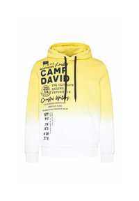 Sudadera con degradado amarillo y blanco, con texto gráfico negro y acentos. Cuenta con capucha con cordón y puños acanalados. Textura de tela suave.