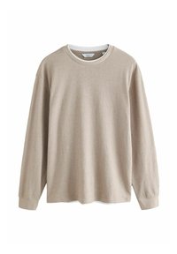 Camisa de manga larga beige con textura acanalada, escote redondo y puños en un color claro que contrasta. Está hecha de una tela suave y ligera.