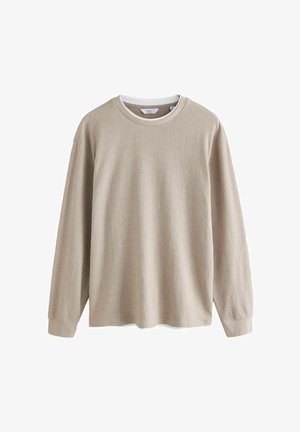 Camisa de manga larga beige con textura acanalada, escote redondo y puños en un color claro que contrasta. Está hecha de una tela suave y ligera.