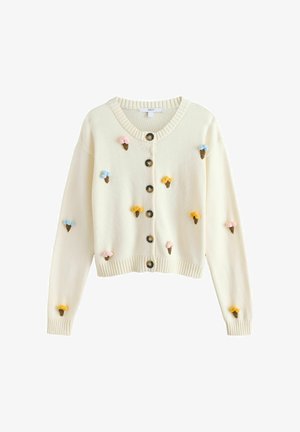 Krém színű kötött kardigán nagy gombokkal és apró, színes, hímzett fagylalt tölcsérekkel a részén és az ujjain.