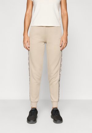 BRITNEY JOGGER - Tracksuit bottoms - pasadena stone