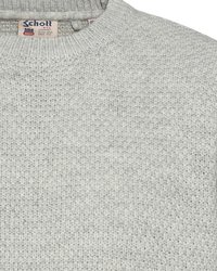 Jasnoszary sweter z dzianiny z okrągłym dekoltem, o teksturowanej tkaninie i subtelnym wzorze. Posiada metkę z logo "Schott NYC".