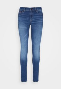 Los jeans skinny de denim azul presentan una cintura de altura media, un diseño clásico de cinco bolsillos, un ligero desvanecimiento y detalles en costura para un toque adicional.
