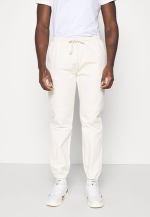 BASIC PANTS - Verryttelyhousut - beige