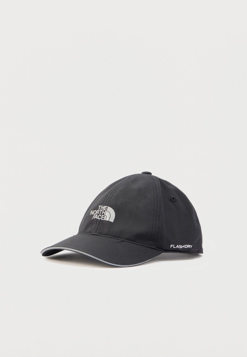 Black North Face baseball cap with curved brim, reflective edge, and "FLASHDRY" text on side, displayed on white background.