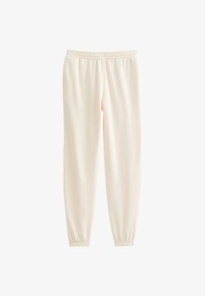 Cremefarbene Sweatpants aus weichem Stoff, ausgestattet mit einem elastischen Bund und gerafften Bündchen an den Knöcheln. Einfaches, lässiges Design.