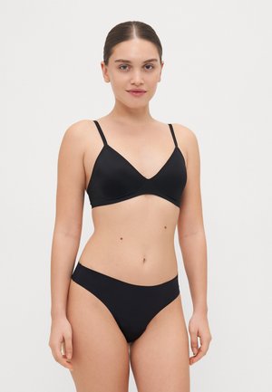 Black bikini set featuring a triangular bralette with thin straps and a matching low-rise bottom, crafted from smooth, stretchy material.