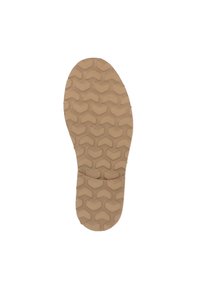 Semelle en caoutchouc beige avec un motif en zigzag, texture lisse, bout légèrement arrondi et un design de soutien de voûte plantaire prononcé.