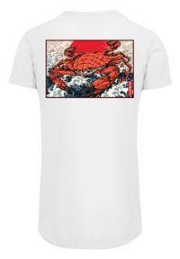 White t-shirt featuring a red crab graphic against a blue wave background, framed in black, with Japanese text at the bottom.