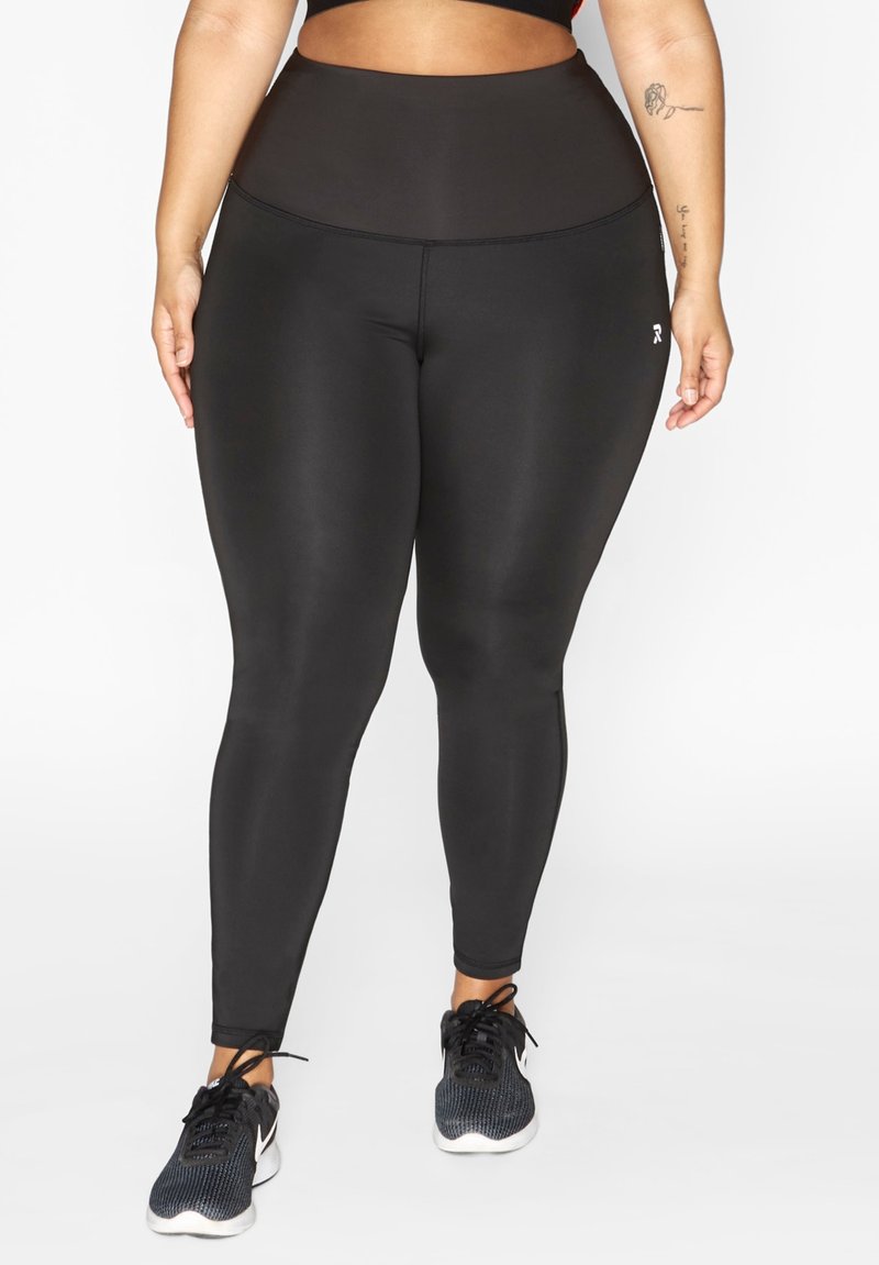 Zwarte high-waisted legging gemaakt van glad, rekbaar materiaal. Beschikt over een brede tailleband en een slim fit silhouette, ideaal voor actieve kleding.