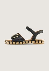 Black leather sandals with a buckle detail, a woven jute sole featuring black and natural stripes, and a back strap for support.