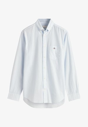 Vaaleansininen, pitkähihainen napitettava paita, joka on valmistettu puuvillasta. Siinä on terävä kaulus, yksi rintatasku ja hienovarainen raidallinen tekstuuri.