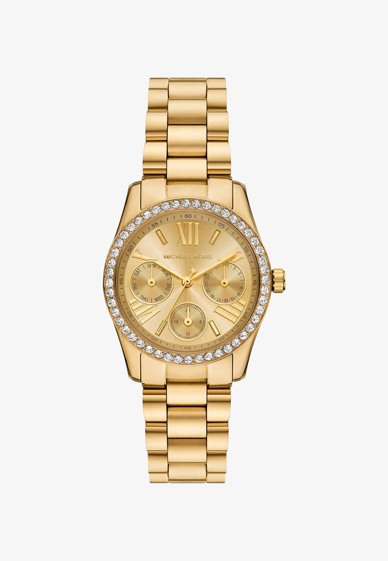 Złoty zegarek na nadgarstek Michael Kors z kryształową obręczą, trzema subtarczami: do wskazywania dnia, daty i czasu 24-godzinnego, oraz połączoną metalową bransoletą.