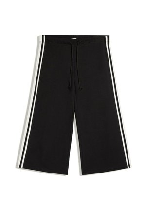 Pantalon noir à jambes larges avec des bandes blanches sur les côtés et une taille à cordon, posé à plat sur un fond blanc.