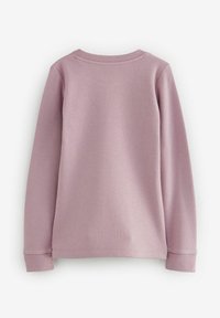 Langarmshirt aus weichem, geripptem Material. Helles Rosa, runder Halsausschnitt und eng anliegende Bündchen. Einfaches Design ohne sichtbare Verzierungen.