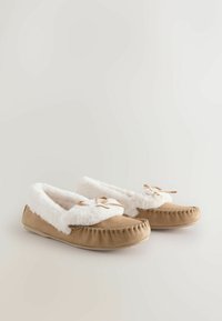 Brown suede slippers with white fur lining and trim, featuring a ribbon bow detail on the front and a stitched seam design.