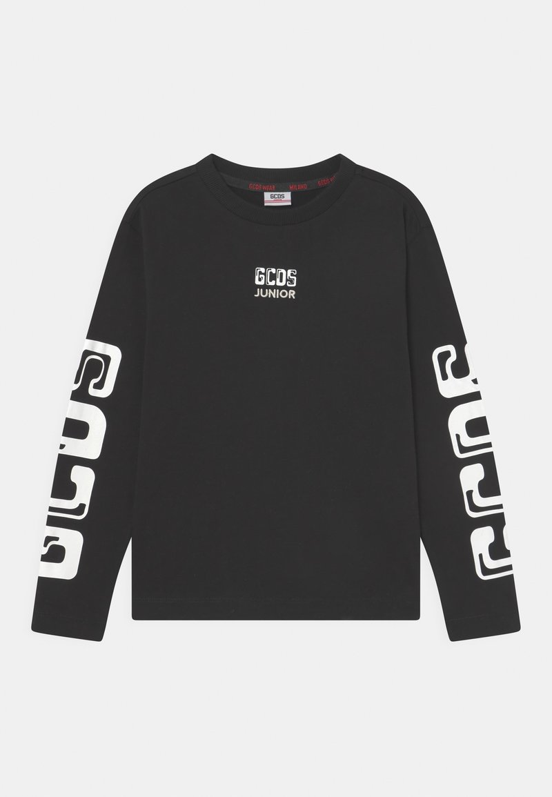 Black long-sleeve T-shirt with "GCOS JUNIOR" logo in white on the chest and large white graphic pattern along both sleeves. Cotton material.
