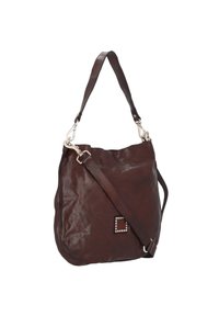 Borsa hobo in pelle marrone con un design morbido, tracolla regolabile e hardware decorativo in argento. Dettaglio quadrato decorato ben evidente.