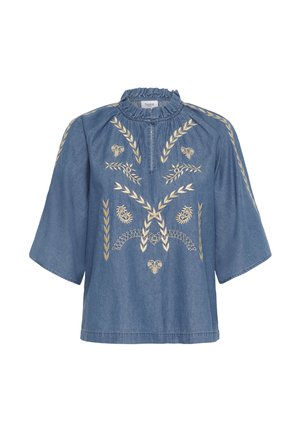 Blouse en denim bleu avec des manches larges, un col volé et une broderie florale et de feuilles beige sur le devant et les épaules.