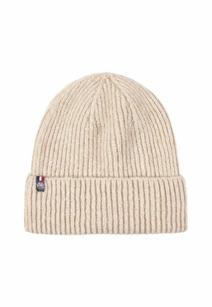 Beige gerippte Strickmütze mit umgekrempeltem Bund, ausgestattet mit einem kleinen Logoetikett mit blauen, weißen und roten Akzenten an der Seite. Weicher Griff.