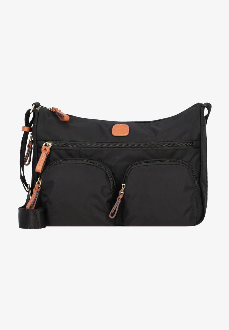 Black nylon crossbody bag with two front zippered pockets, tan leather accents, and a detachable strap for versatile carrying options.