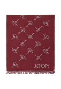 Écharpe rouge ornée d'un motif répétitif de dessins floraux gris et du nom de la marque "JOOP!" en bas à droite, finie avec des bords frangés.
