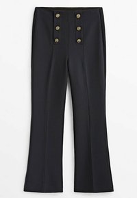 Muoti mustat housut korkealla vyötäröllä, joissa on kultaiset koristepainikkeet ja levenevä lahjemuotoilu, valmistettu sileästä kankaasta.