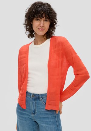 Red, lightweight cardigan with ribbed texture and open front. Worn over a white top, paired with blue jeans, featuring a casual fit.
