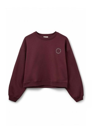 Burgundy cropped sweatshirt with long sleeves, ribbed cuffs, and round neckline. Features a circular graphic logo on the left chest.