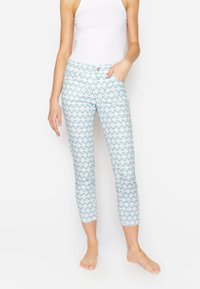 Blauwe geplooide capri-broek met een zachte, lichte stof. Bevat zijzakken en een strakke, getailleerde pasvorm.