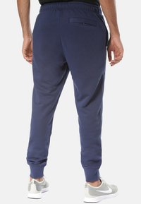Nike Sportswear Tracksuit bottoms - blue