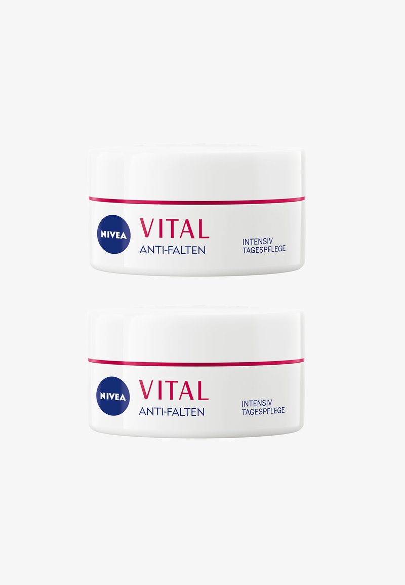 Two white Nivea Vital Anti-Falten cream jars with pink and blue text, labeled for intensive daily care against wrinkles.