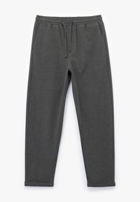 Donkergrijze joggers gemaakt van gestructureerde stof, met een elastische tailleband, een koordsluiting en taps toelopende benen met opgerolde zoom.