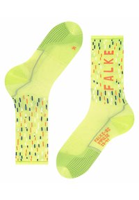 Helle gelbe Socken mit einem strukturierten Muster und blauen, orangefarbenen und weißen Akzenten. Enthält Markenkennzeichnungen und verschiedene grafische Elemente.