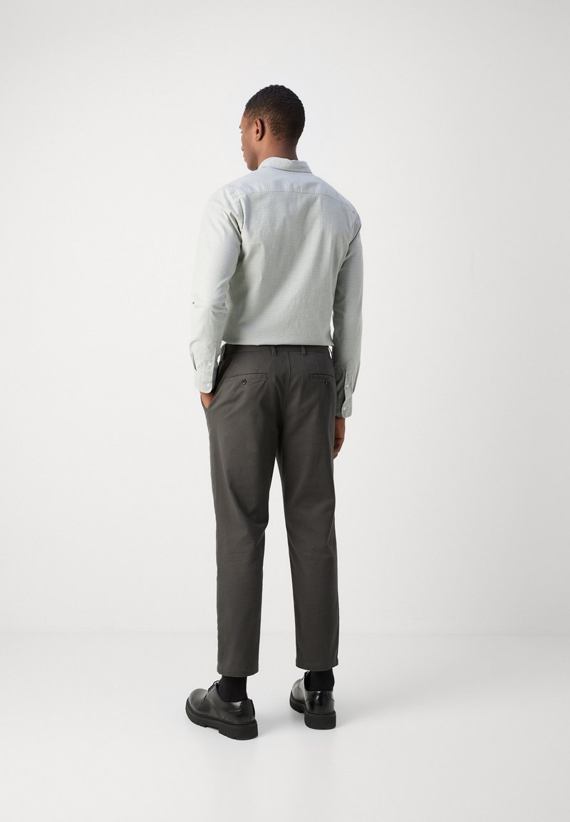 Scotch & Soda Broek in effen design, model 'The Drift' in olijfgroen online kopen | P&C