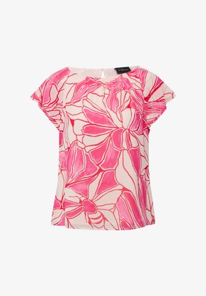 Blouse à manches courtes en tissu léger, avec un motif floral rose et des contours blancs, et un détail en forme de trou de serrure dans le dos.