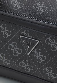 Guess VEZZOLA SMART BEAUTY CASE UNISEX - Wash bag - dark black