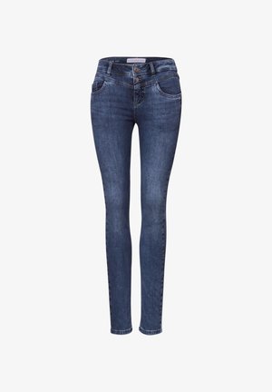 Enge Jeans aus dunklem Denim mit mittlerer Taille, zwei vorderen Taschen und doppeltem Knopfverschluss. Glatte Textur mit minimaler Ausbleichung.