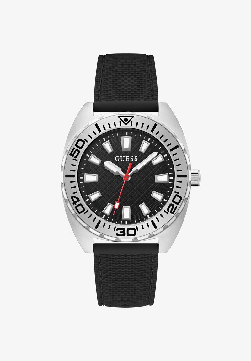 Montre avec un bracelet en caoutchouc noir, un boîtier en acier inoxydable argenté, un cadran noir texturé, des index horaires blancs et une aiguille des secondes rouge. Résistante à l'eau.