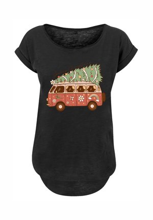 Black t-shirt with a red vintage van decorated with flowers carrying a decorated Christmas tree on its roof.