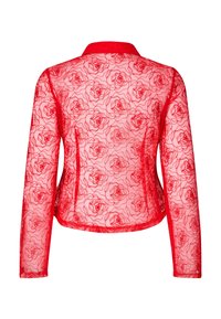 Red sheer jacket featuring a floral rose pattern, tailored design with long sleeves, and a collar, finished with a solid red trim.