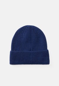 Navy blue knit beanie with ribbed texture, foldable cuff, and seamless crown. Soft fabric suitable for cold weather.