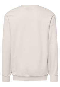 Ljusbeige sweatshirt med långa ärmar, ribbade ärmslut och nederkant. Slät textur, rundad halsdesign och inga synliga mönster eller accenter.